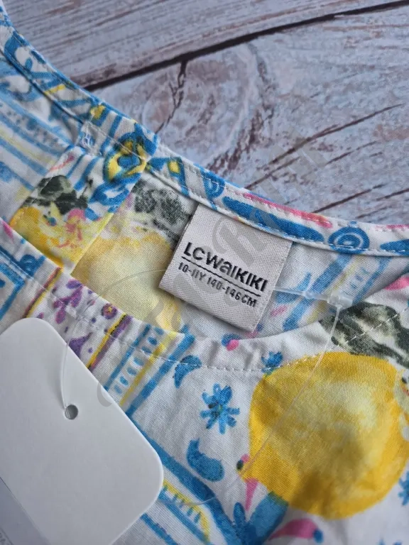 Летнее платье Lc Waikiki для девочки 140/146см.