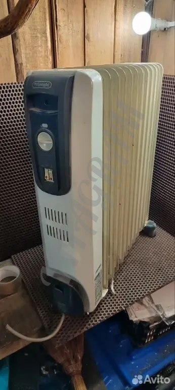 Масляный обогреватель Delonghi