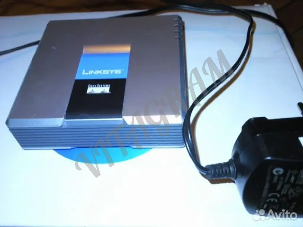VoIP шлюз Linksys SPA 2102 c б. п