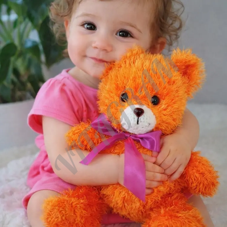 Вязаный, мягкий медвежонок